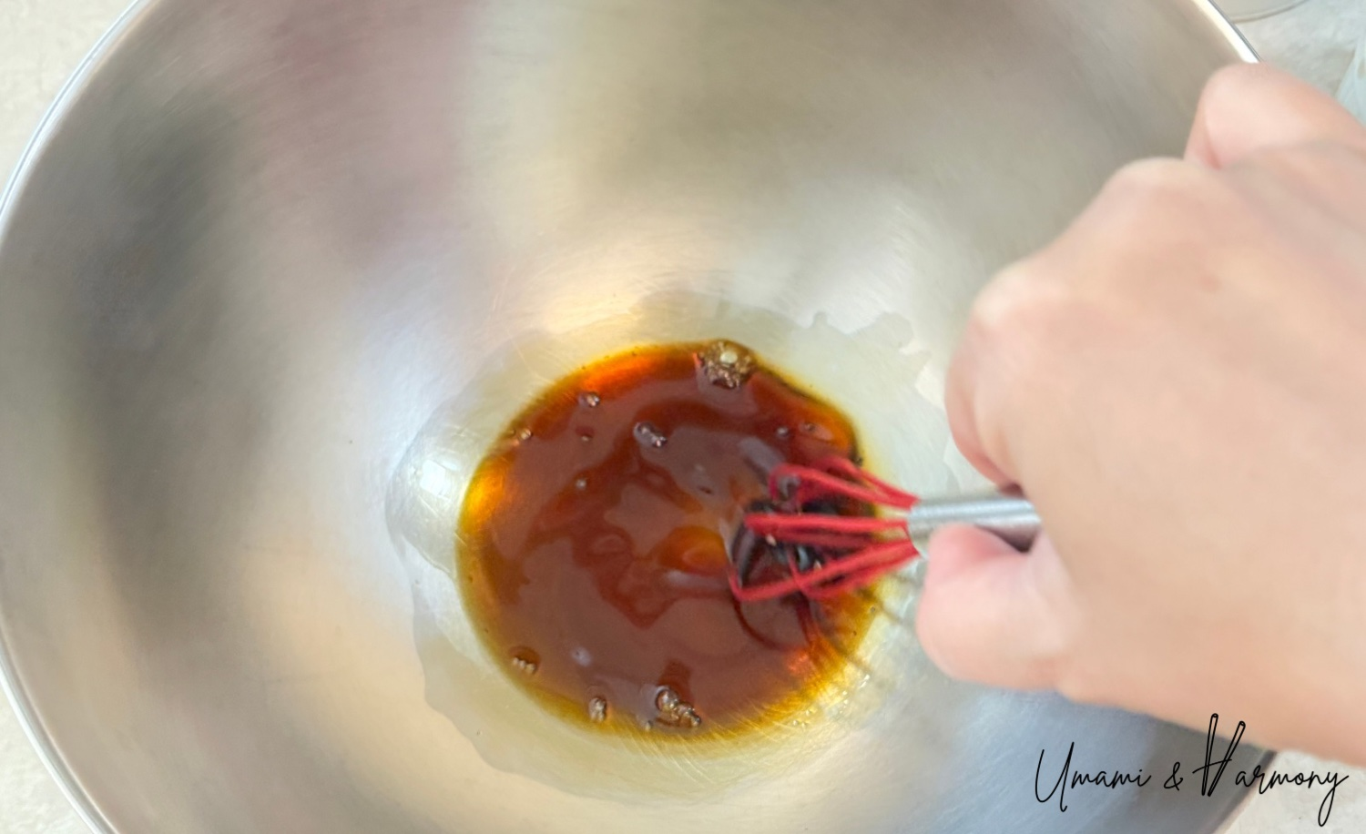 In a medium mixing bowl, combine soy sauce and maple syrup.