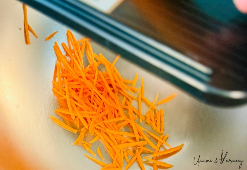 Julienned carrots in a bowl