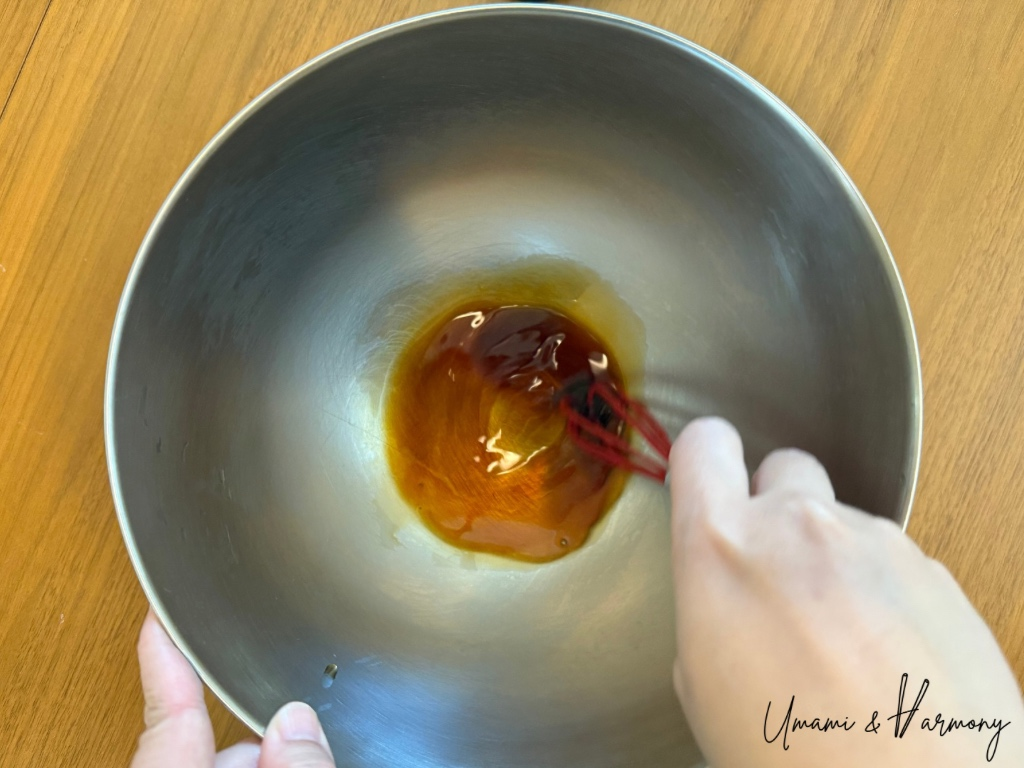 Soy sauce and maple syrup mixed together in a bowl