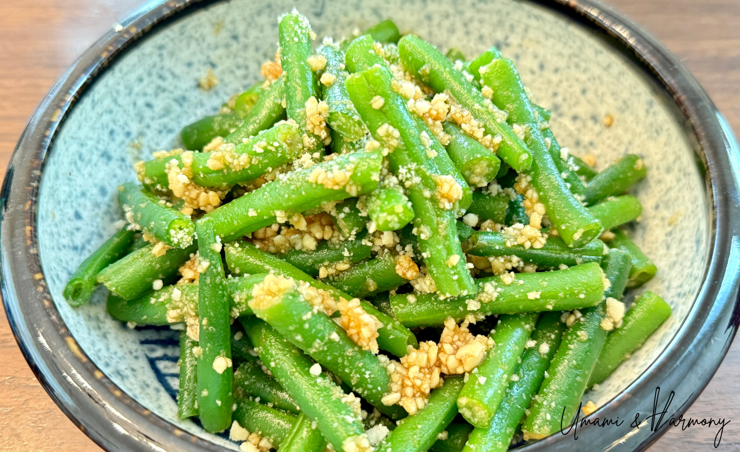 Green Beans with Peanut Sauce served in a bowl.