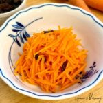 quick easy carrot salad served in a small bowl