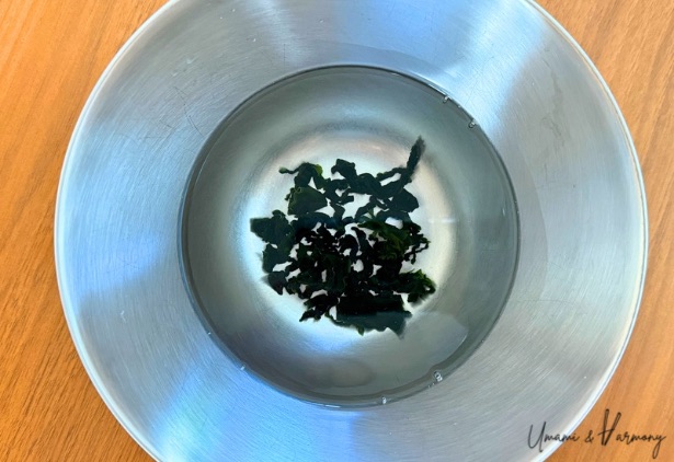 Dried wakame in a bowl of water