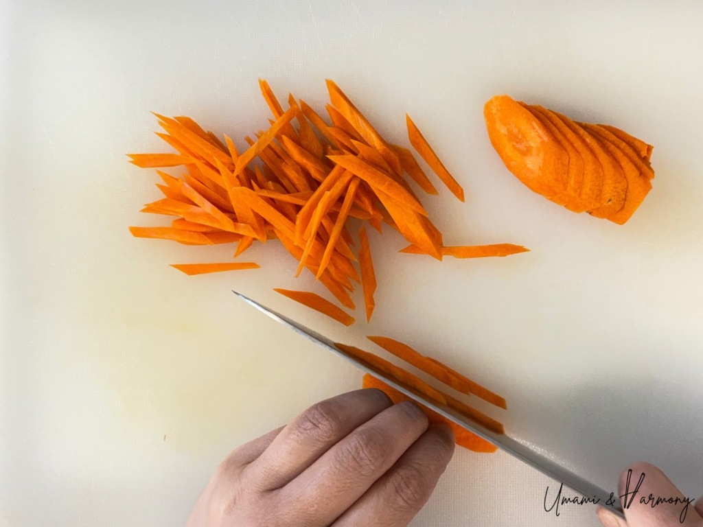 Carrot matchsticks cut into thin strips for Kinpira Gobo