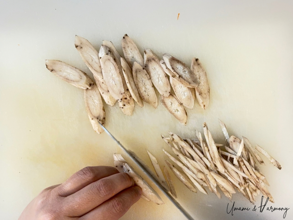Burdock root matchsticks cut into thin strips for Kinpira Gobo