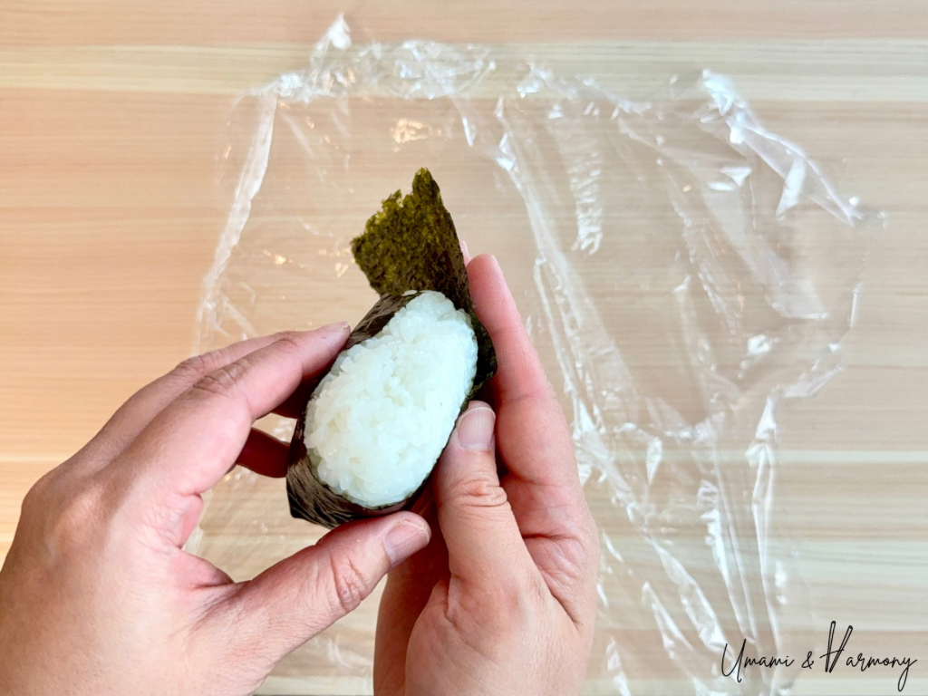 Nori strip wrapped around the rice ball.
