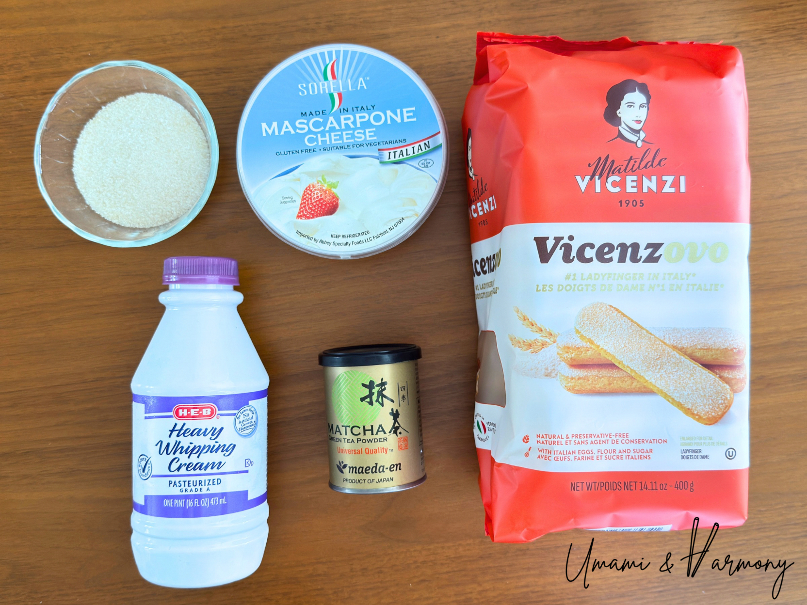 Ingredients for Matcha Tiramisu: mascarpone cheese, ladyfingers, matcha powder, heavy cream, and sugar