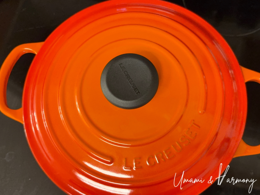 Dutch oven covered with a lid during Nikujaga cooking