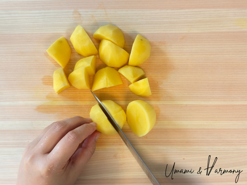 Potatoes cut into wedges for Nikujaga