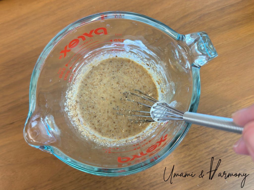 All dressing ingredients combined in a small bowl for sesame coleslaw