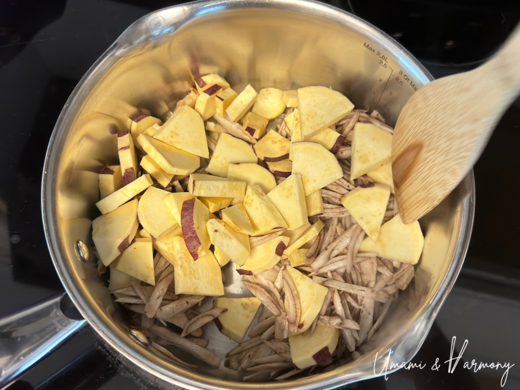 Sliced vegetables stir-frying in a pot