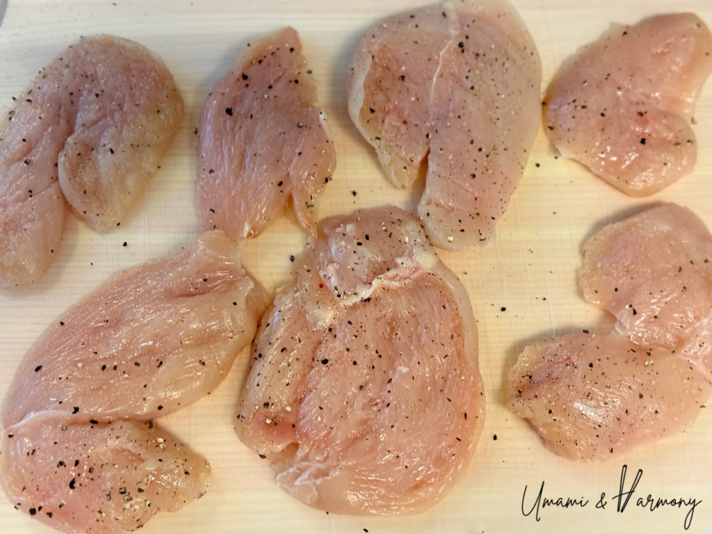 Chicken slices seasoned with salt and pepper