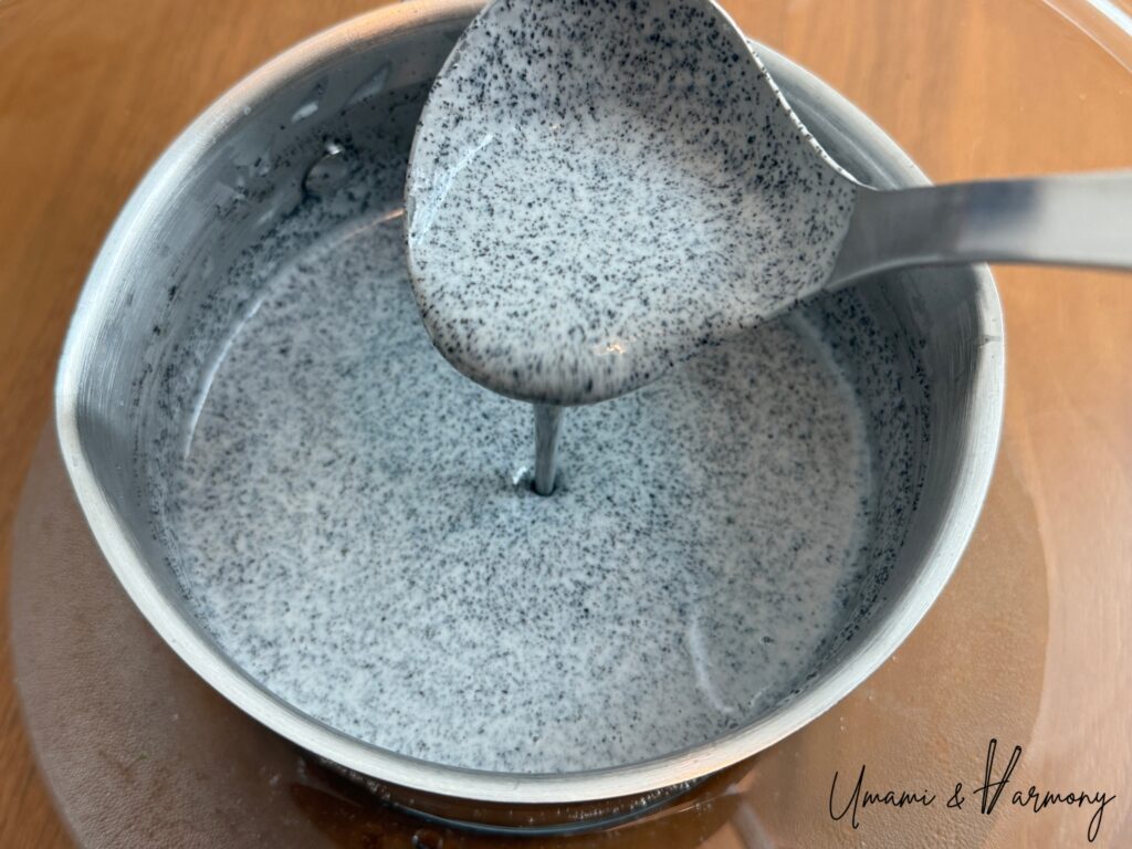 Slightly thickened black sesame mixture ready to be poured into cups