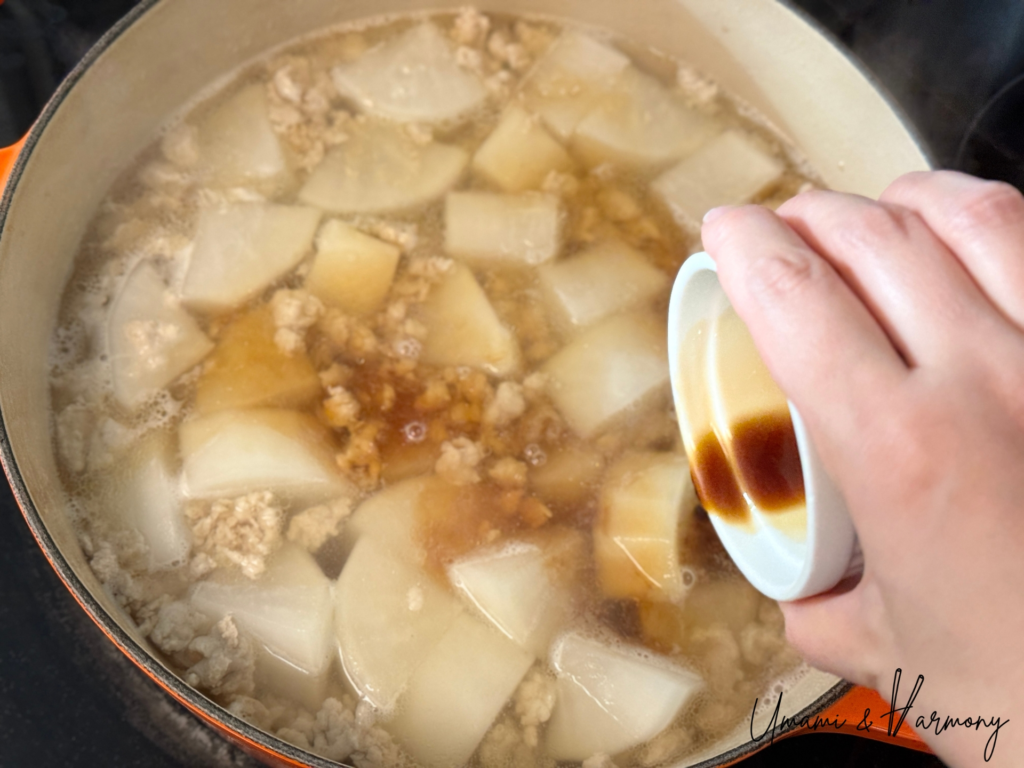 Soy sauce, mirin, sake, and sugar added to simmered daikon