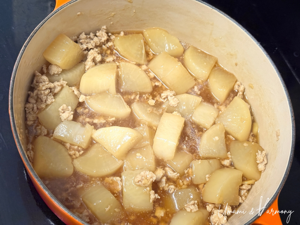 Simmered daikon with chicken soboro coated in glossy sauce