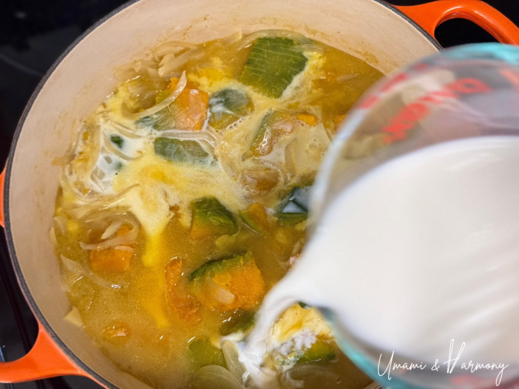 Milk being added to the blended kabocha soup