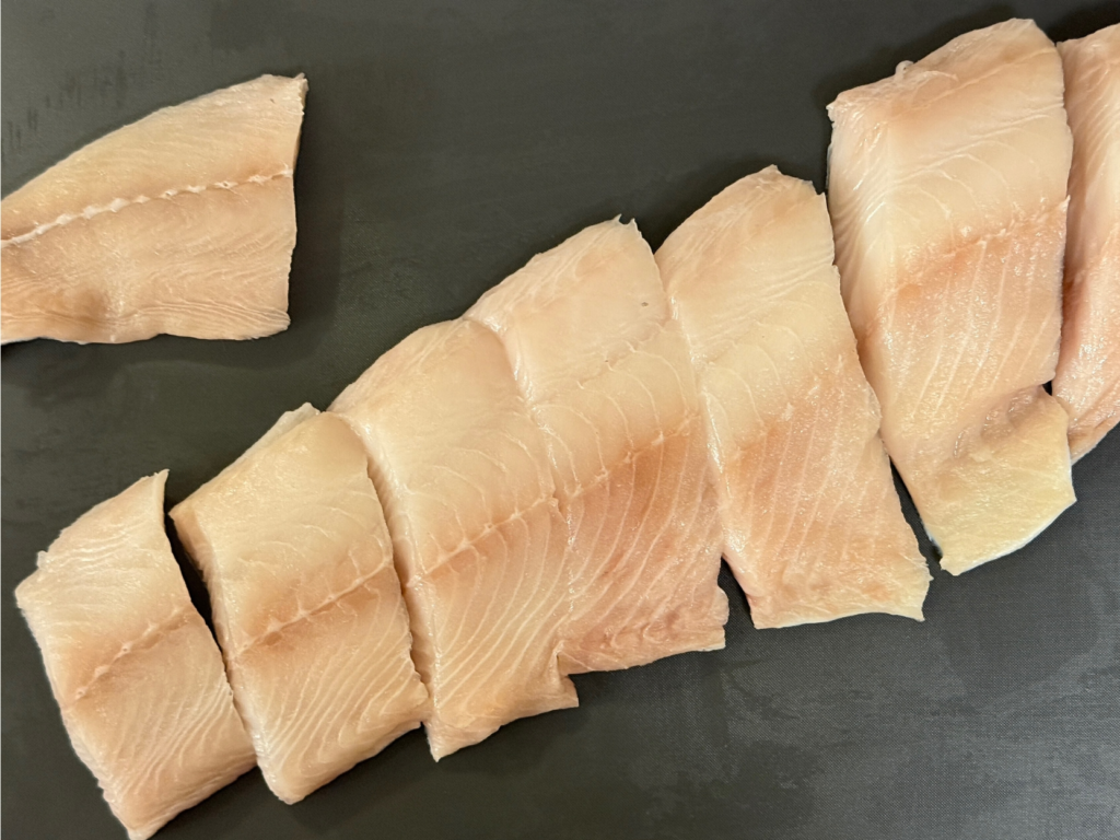 Black cod cut into thick portions for marinating