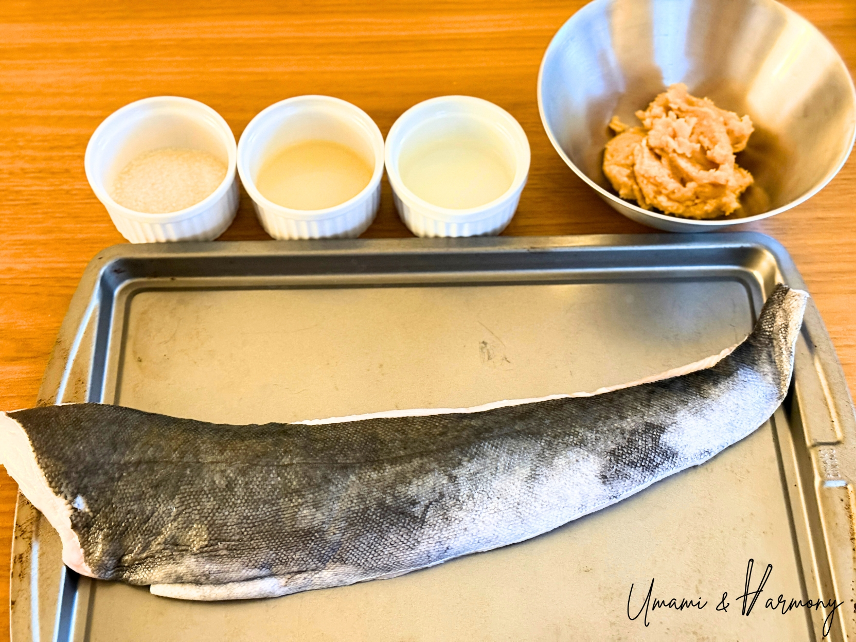 Ingredients for miso-marinated black cod including sablefish, miso, sake, mirin, and sugar