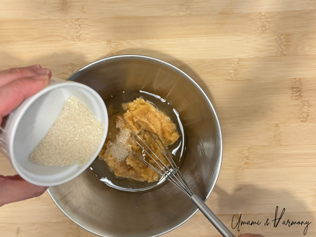 Miso, sake, mirin, and sugar are added in a bowl