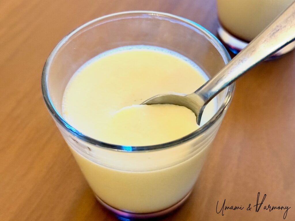 Japanese Purin being picked up with a spoon