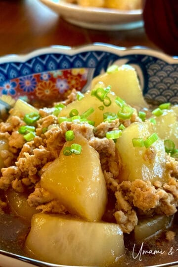 Simmered Daikon with Chicken Soboro served in a bowl