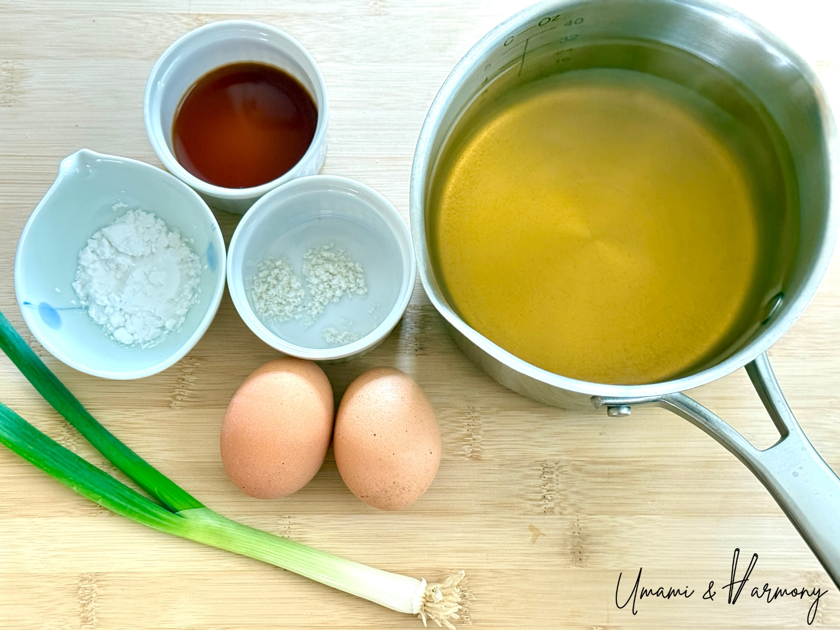 Ingredients including eggs, dashi broth, soy sauce, sea salt, potato starch and green onion