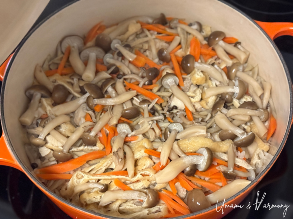 Lid just removed to reveal freshly cooked gomoku takikomi gohan