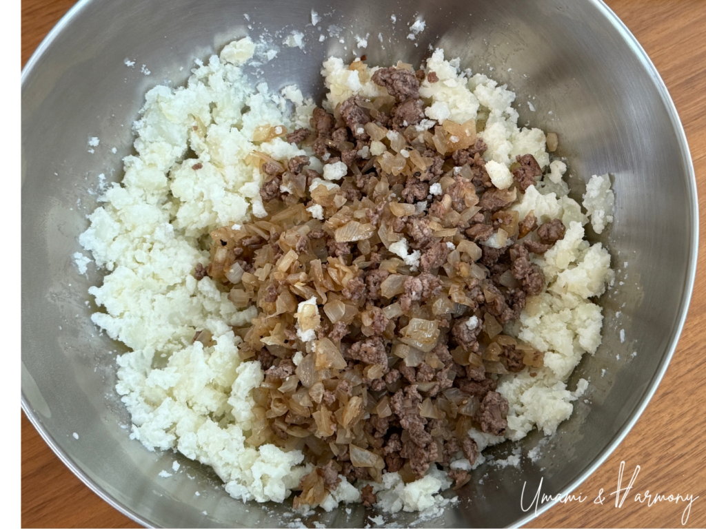 Potato mixture combined with sautéed beef and onion