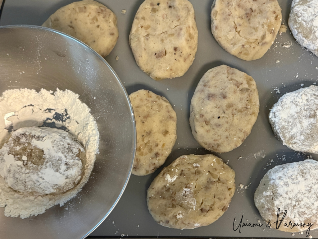 Croquettes being dredged in flour