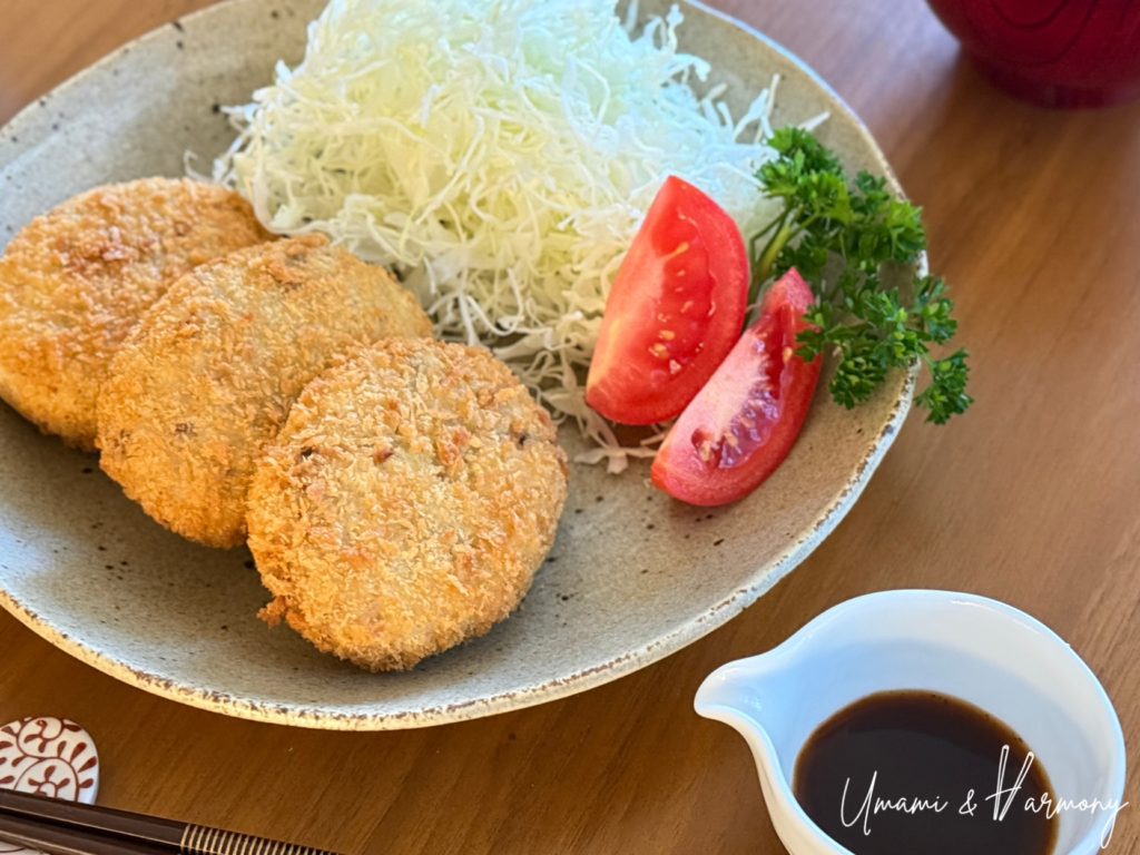 Croquette served with sauce on the side, ready to eat