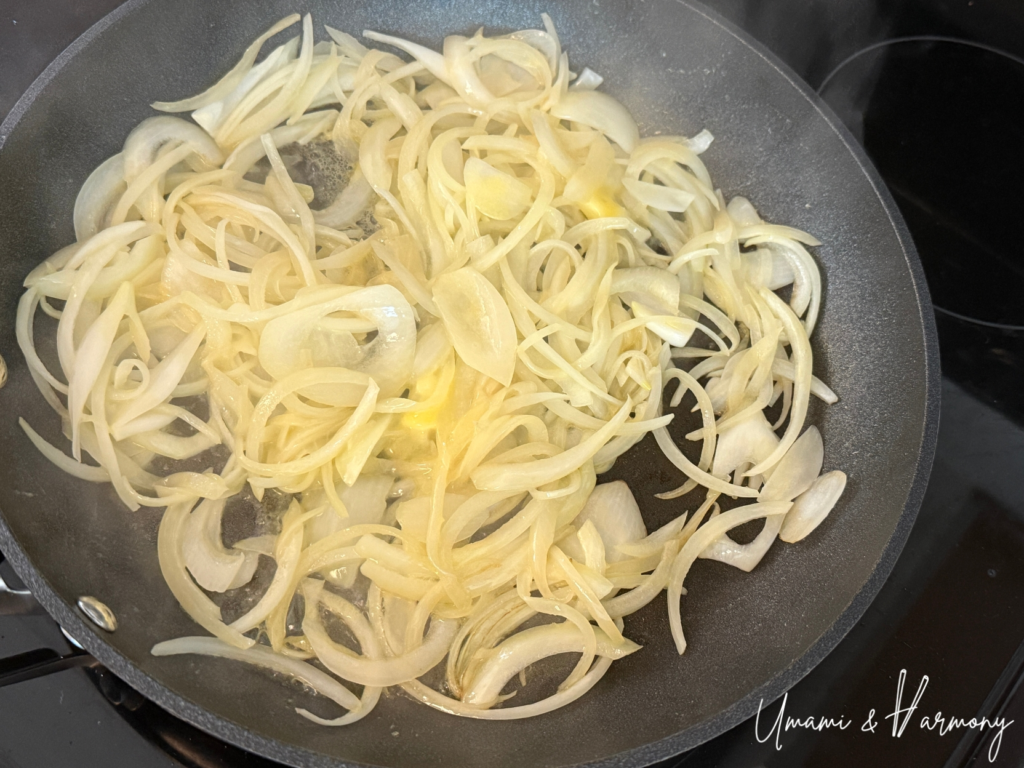 Onion being sautéed until soft and translucent