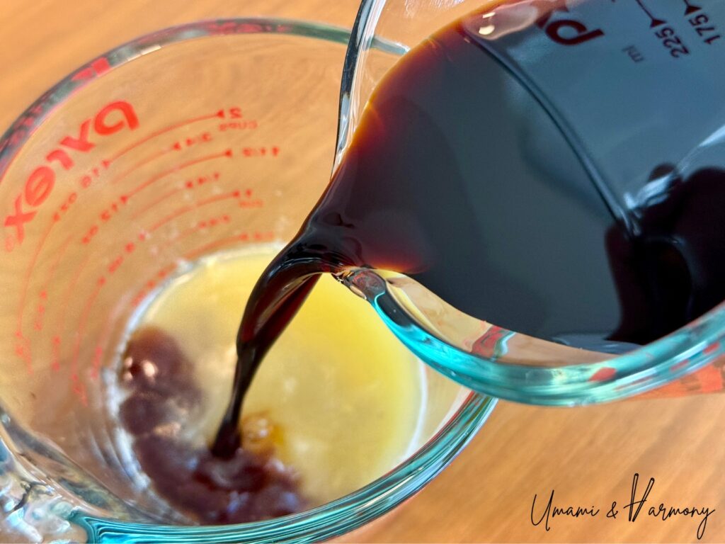Meyer lemon juice and soy sauce being mixed together