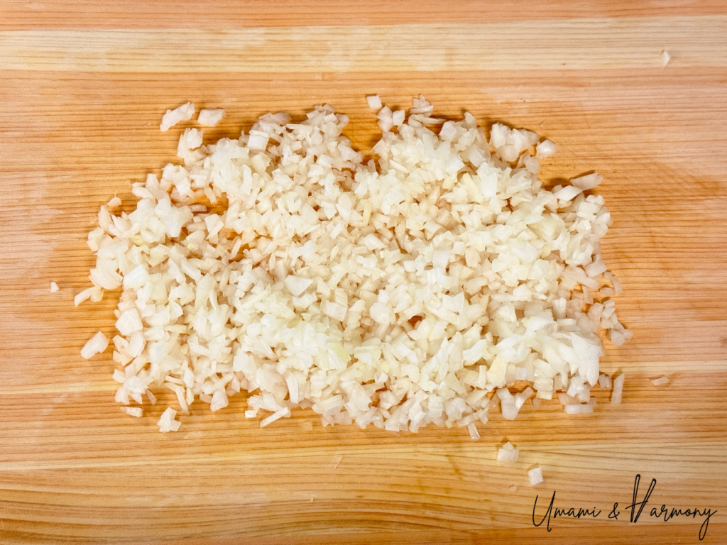 Finely chopped onion on a cutting board