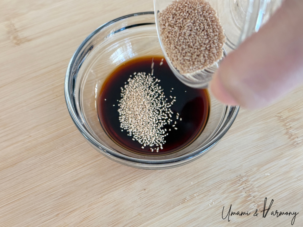 Dashi powder being added to soy sauce