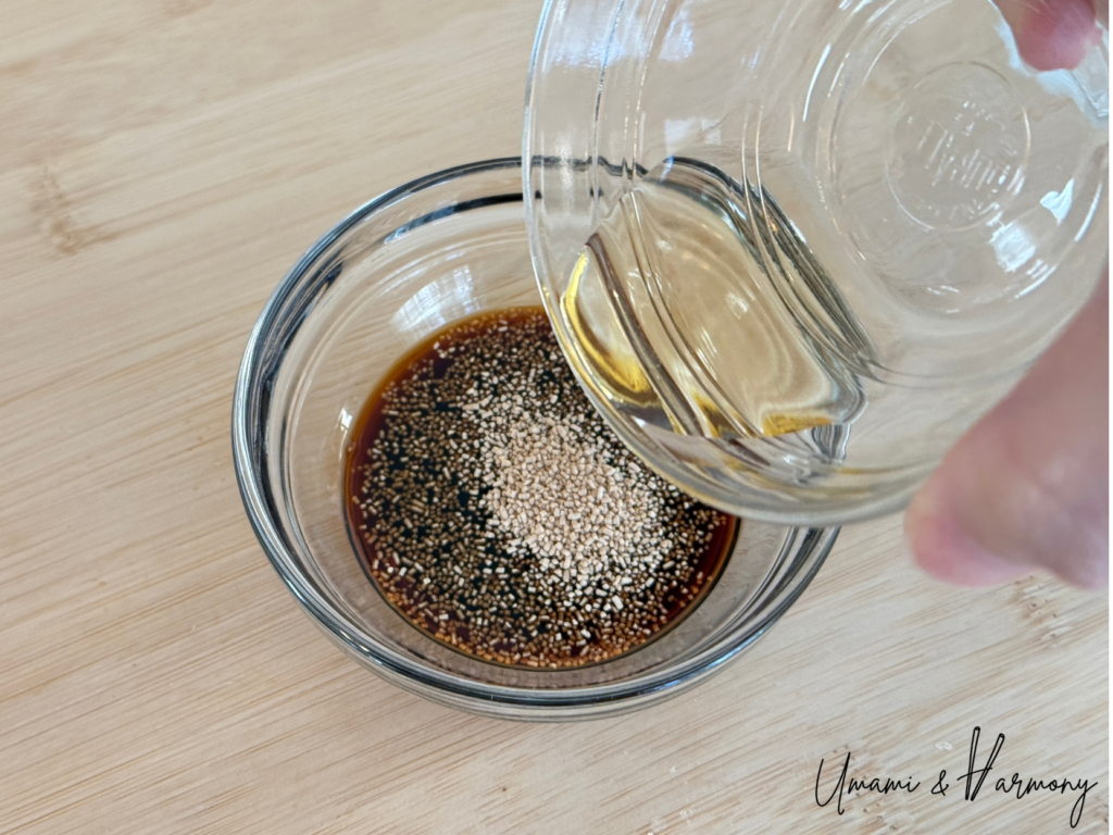 Mirin being added to soy sauce mixture for ninjin shirishiri seasoning