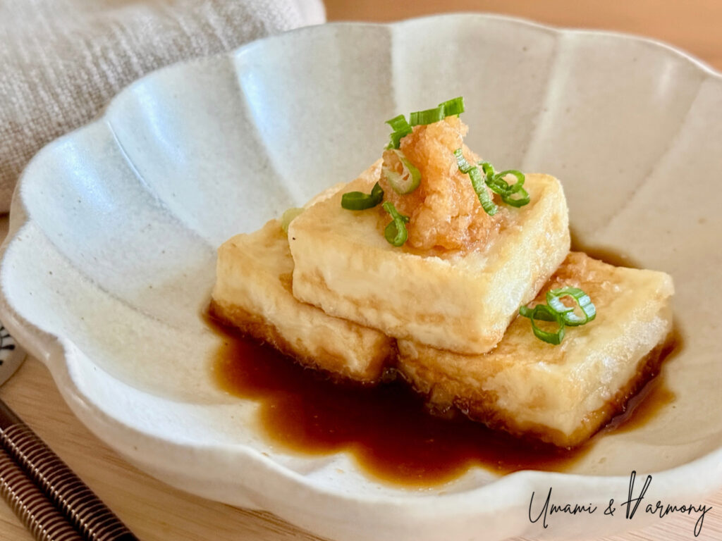 Grated daikon and green onion added on top of tofu