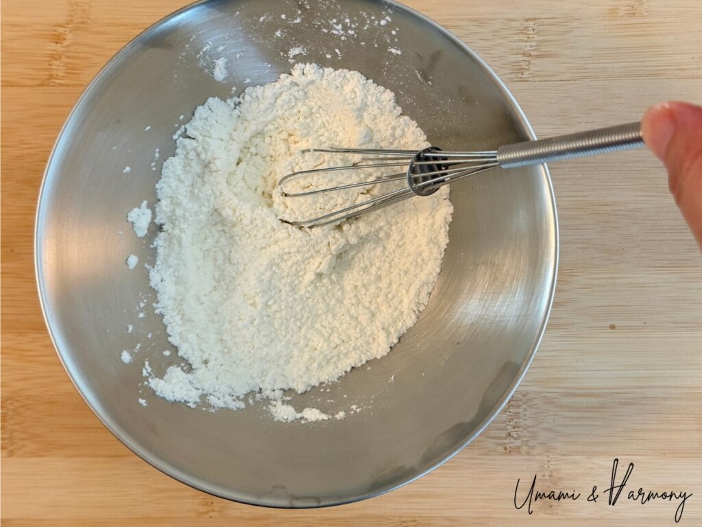 Flour and starch mixed together in a small bowl 