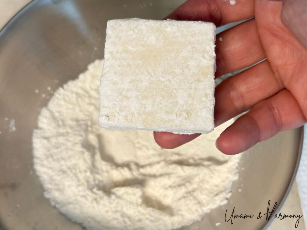Tofu pieces coated with flour and starch mixture