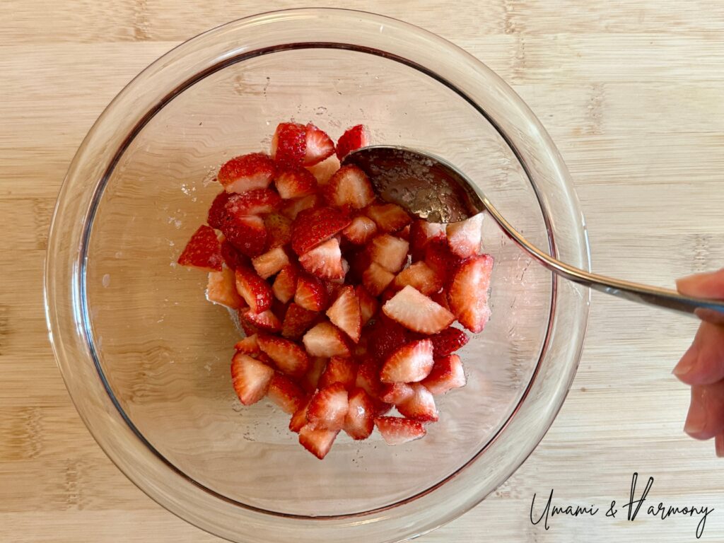 Strawberries mixed with sugar and lemon juice