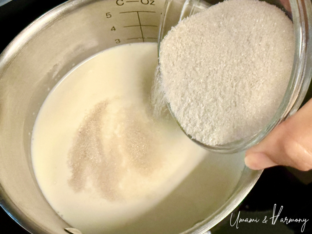 Milk, cream, and sugar warming in a pot