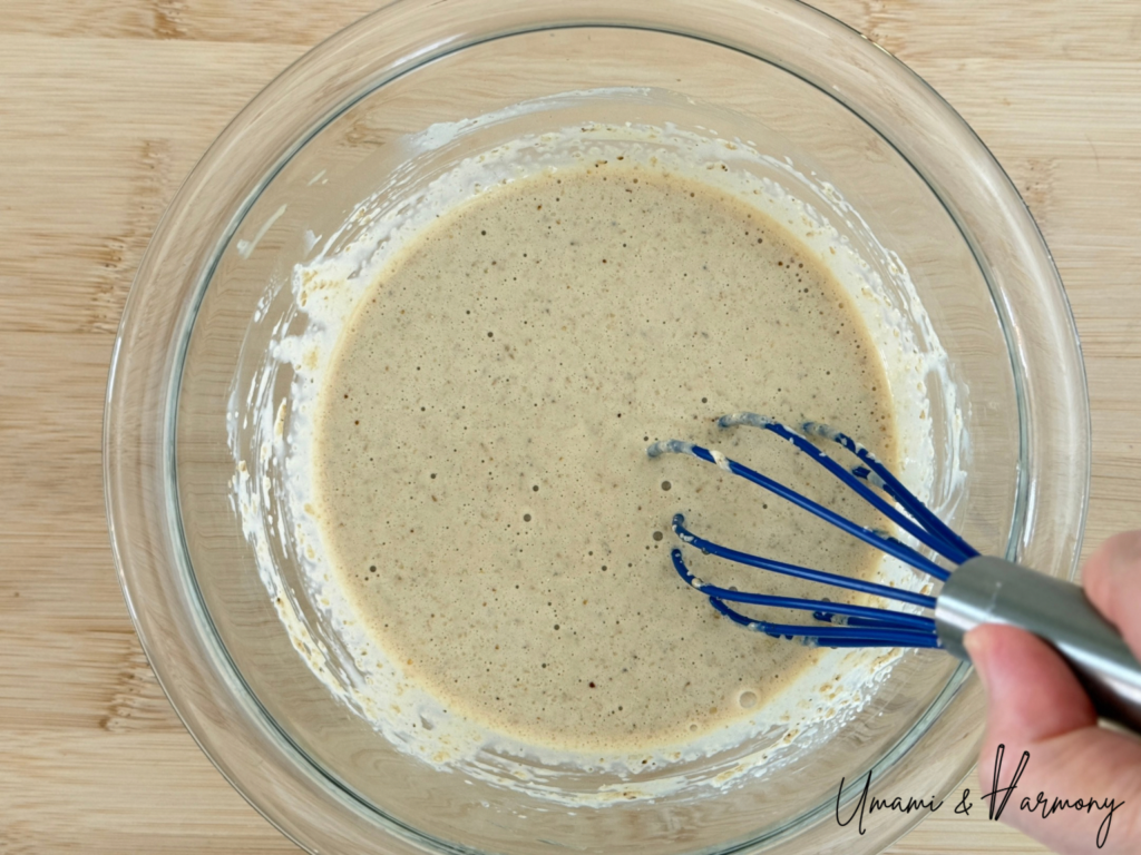 Sesame, mayo, sugar, and dashi powder being whisked together