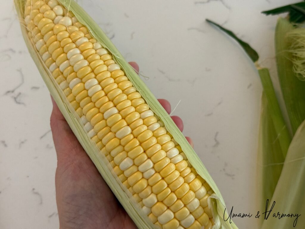 Fresh corn with husk removed