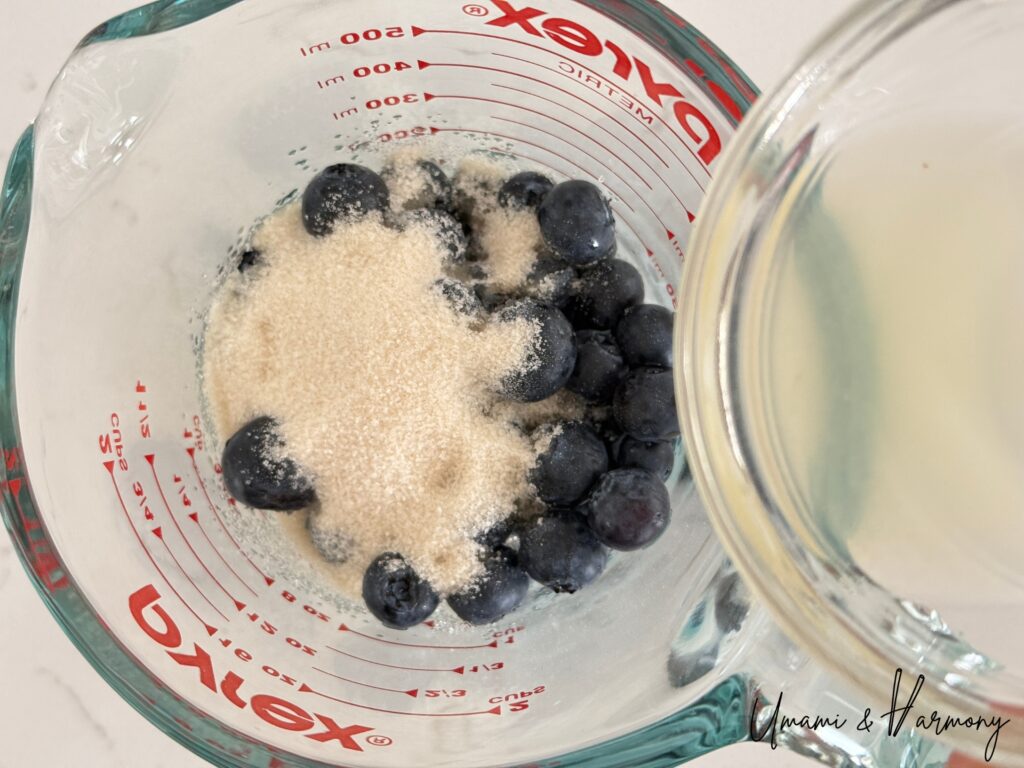 Blueberries mixed with sugar and lemon juice