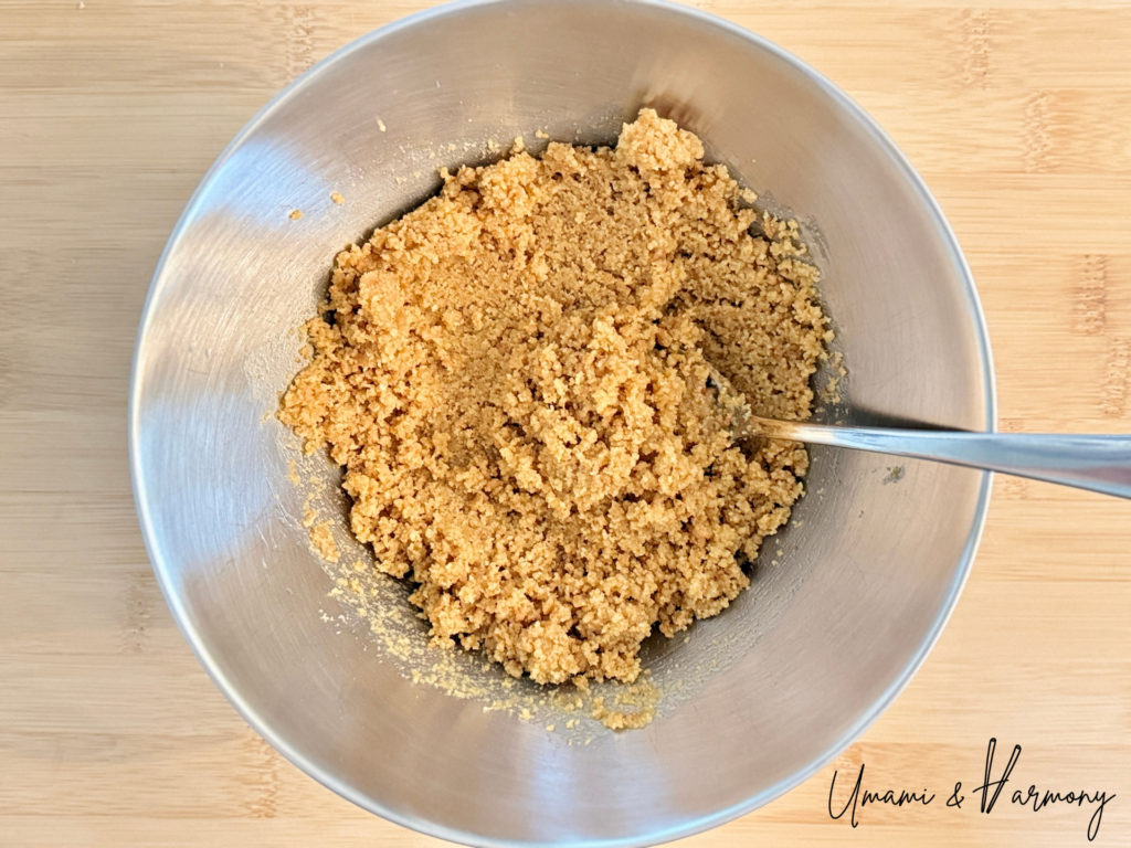 Graham cracker crumbs mixed with melted butter
