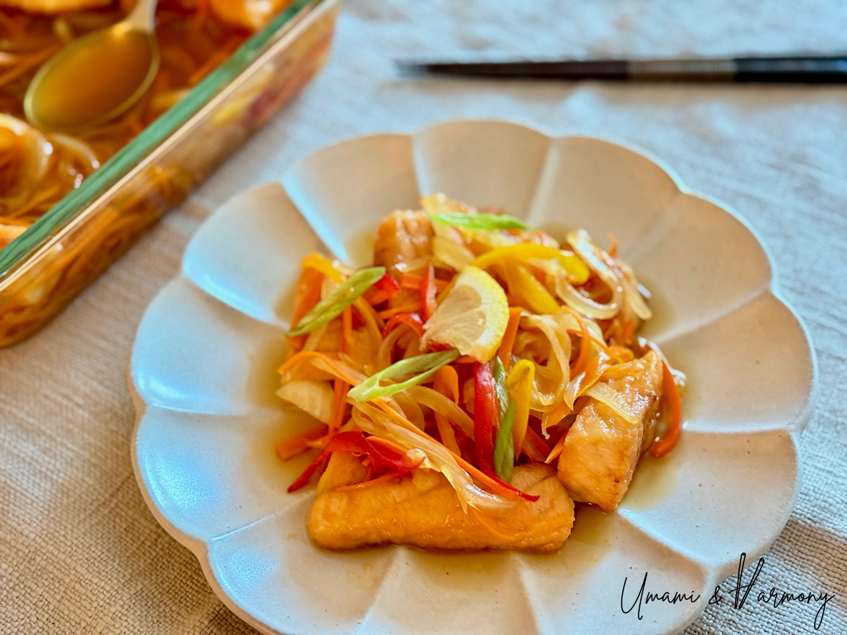 Salmon Nanbanzuke with colorful vegetables served in a dish