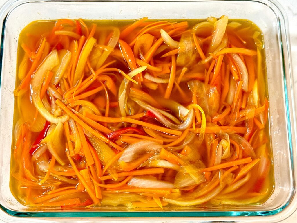Sautéed vegetables added to the Nanbanzuke marinade