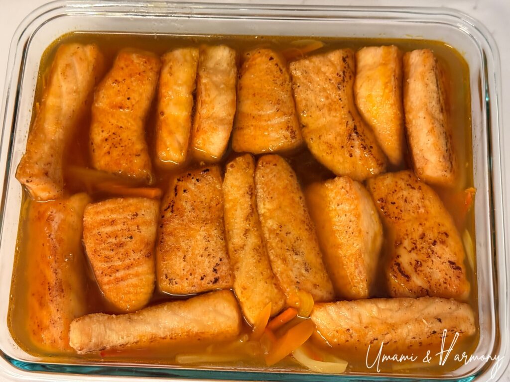 Salmon and sautéed vegetables soaking in Nanbanzuke marinade